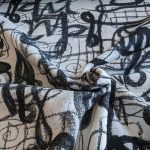 French Terry, Sweatshirtstoff, schwarze Graffiti Schrift auf Ecru